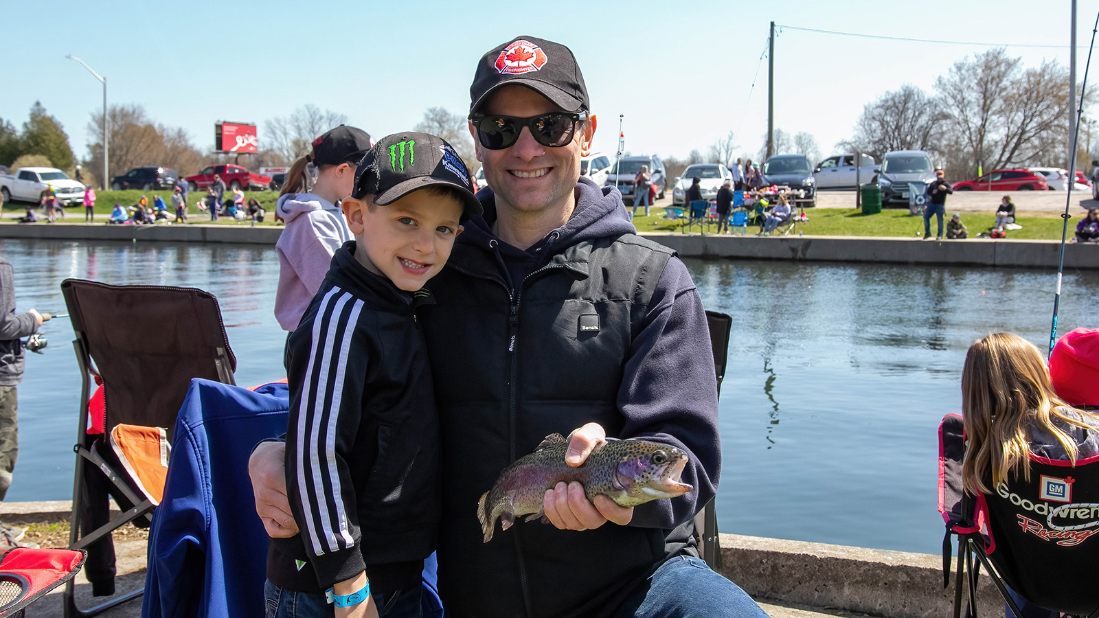 Dand and son with fish caught at fishing derby