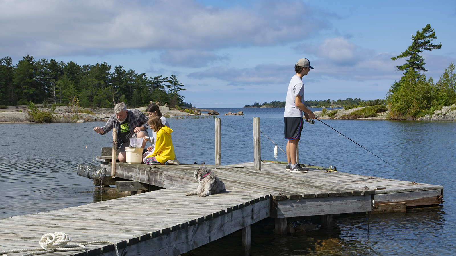 Family fishing on the docks